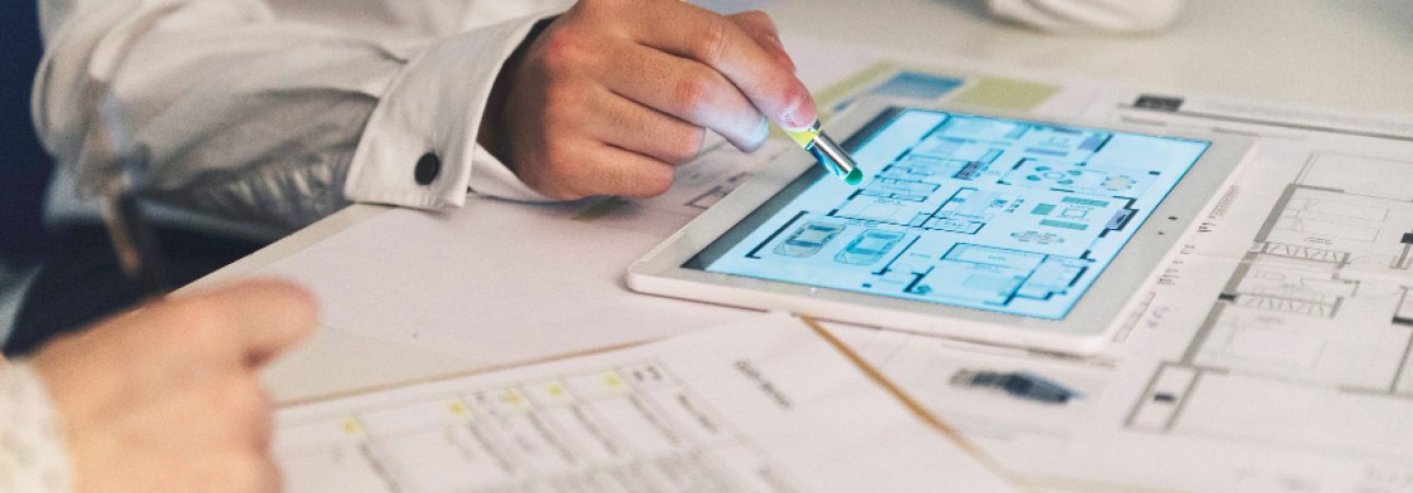 crop-people-working-with-plans-tablet